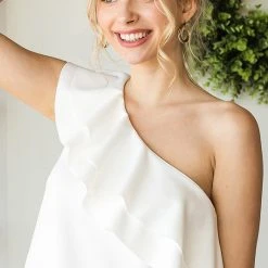 Purple Door Boutique Ruffled Shoulder Off White Top