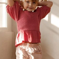 Purple Door Boutique New Arrivals Youth Rose Smocked Peplum Top